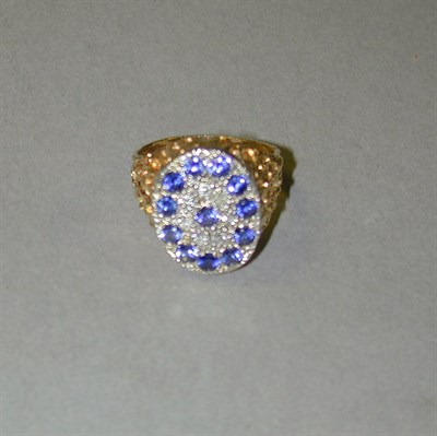 Lot 146 - Diamond and Blue Stone Ring The heavily...