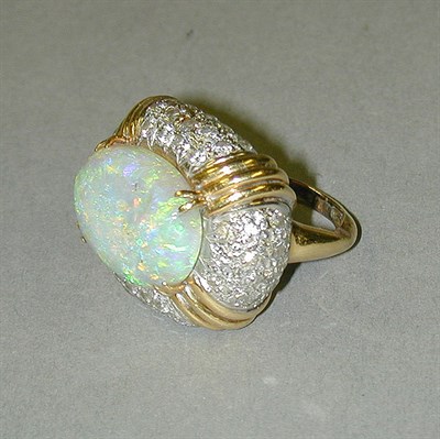 Lot 334 - Opal and Pave Diamond Ring Yellow gold, set to...