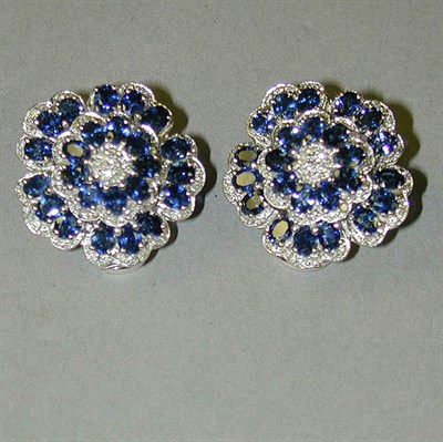 Lot 347 - Pair of Sapphire and Diamond Flower Earclips...