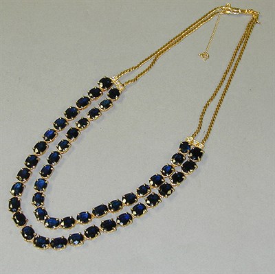 Lot 375 - Sapphire Necklace 14 kt. yellow gold, the...