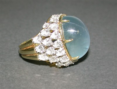 Lot 466 - Star Sapphire and Diamond Ring 18 kt. yellow...