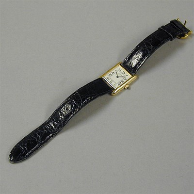 Lot 286 - Lady's Gold Tank Wristwatch The leather band...