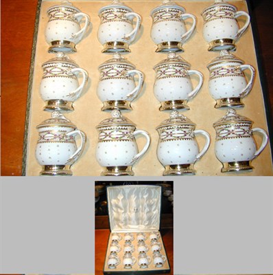 Lot 319 - Set of Twelve Silver Plate Mounted Pot de...