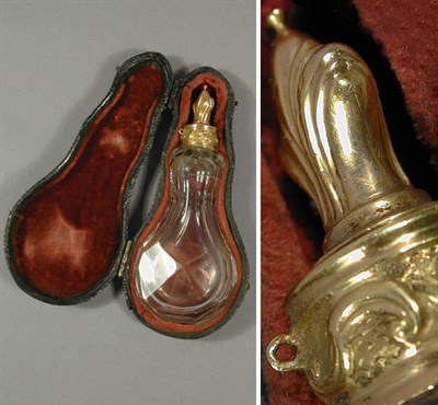 Lot 135 - Perfume Bottle The teardrop-shaped glass...