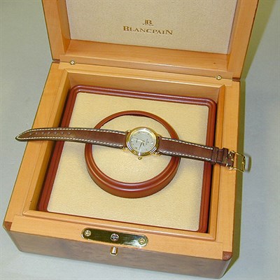 Lot 285 - Lady's Gold Wristwatch The leather band...