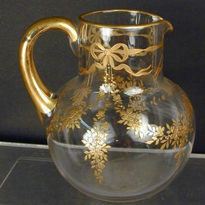 Lot 789 - Colorless Glass Gilt Decorated Pitcher