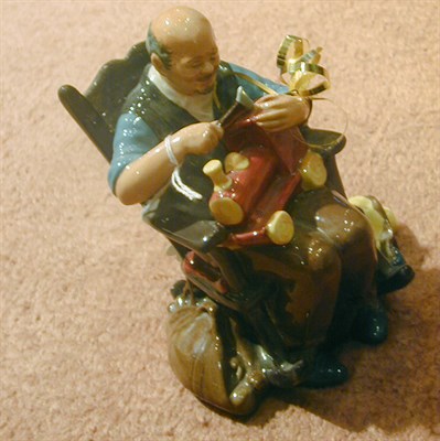 Lot 815 - Royal Doulton Porcelain Toy Maker Figurine