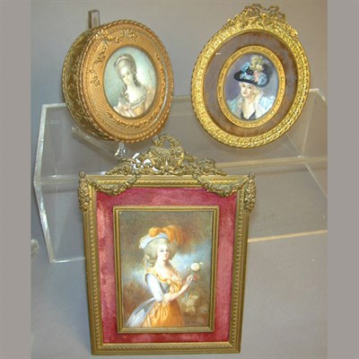 Lot 626 - Two Brass-Mounted Portrait Miniatures...