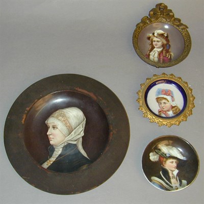 Lot 501 - Four Continental Porcelain Portrait Plates...