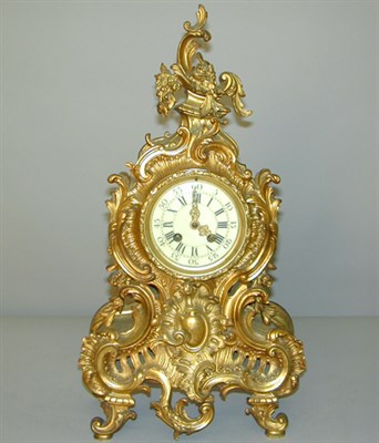 Lot 492 - Louis XV Style Gilt-Bronze Clock The cartouche-...