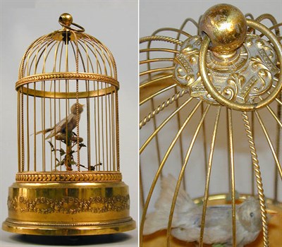 Lot 365 - Brass Singing Bird Automaton The feathered...