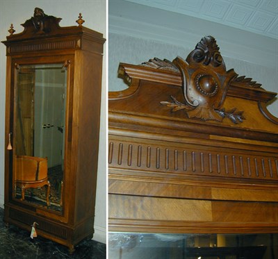 Lot 524 - Louis XVI Style Walnut Armoire The foliate...