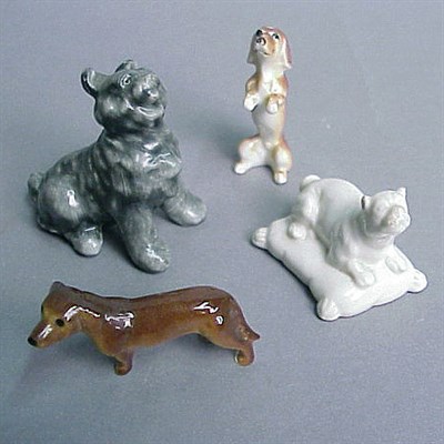 Lot 24 - Group of Four Miniature Porcelain Figurines...