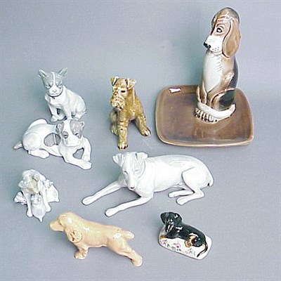 Lot 14 - Group of Eight Porcelain Figurines Each...