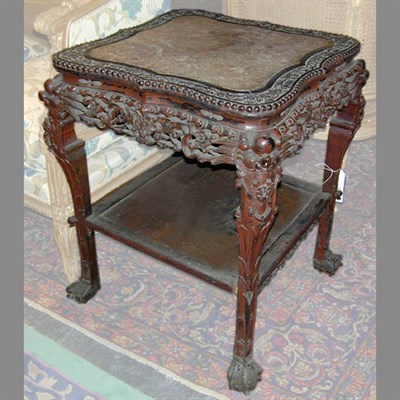 Lot 672 - Chinese Carved Hardwood Table The inset marble...