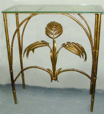 Lot 223 - Art Deco Gilt-Metal Console With a glass top,...