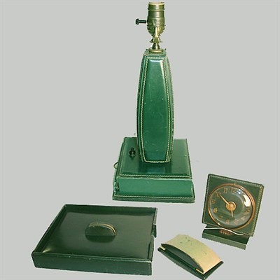 Lot 140 - Art Deco Leather Desk Set Comprising a lamp,...