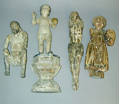 Lot 193 - Group of Four Miscellaneous Carved Wood Santos...