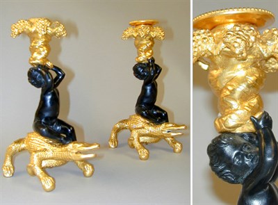 Lot 591 - Pair of Rococo Style Gilt and Patinated-Bronze...