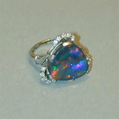 Lot 369 - Black Opal and Diamond Ring Platinum and 18 kt....