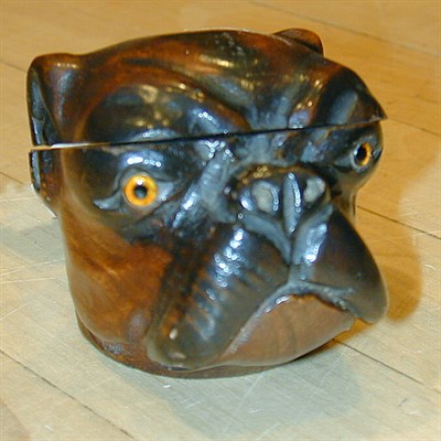 Lot 105 - A late Victorian carved wooden inkwell in the...