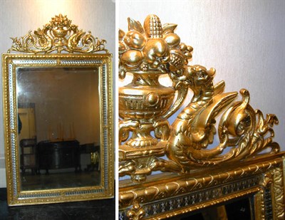 Lot 423 - Rococo Style Gilt Carved Wood Mirror The crest...