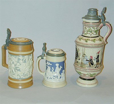 Lot 264A - Two Mettlach Steins Together with a German Stein