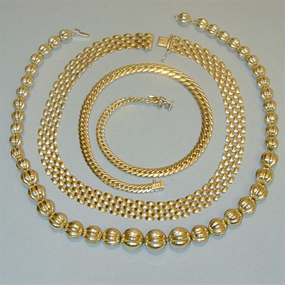 Lot 367 - Three Gold Chains 14 kt. yellow gold, the...