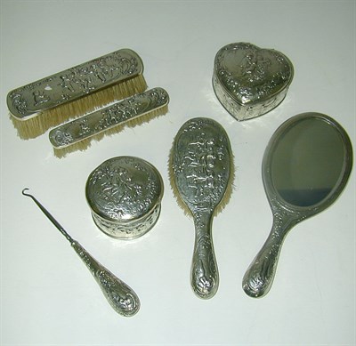 Lot 297 - German Silver Repousse Seven-Piece Vanity Set