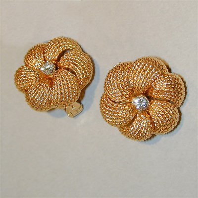 Lot 204 - Pair of Gold and Diamond Flower Earclips 18 kt....