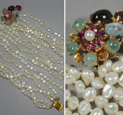 Lot 107 - Multistrand Pearl Necklace The 27 inch...