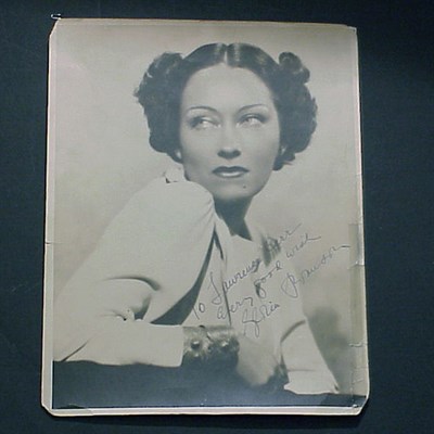 Lot 137 - SWANSON, GLORIA Bust length photograph...