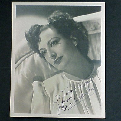 Lot 84 - CRAWFORD, JOAN Head photograph inscribed to...