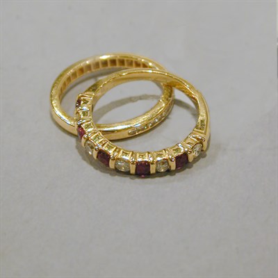Lot 237 - Two Gold Wedding Bands 14 kt. yellow gold,...