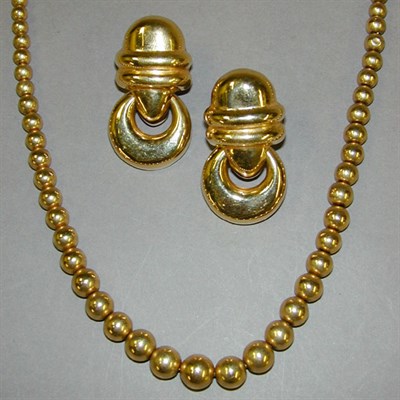Lot 109 - Gold Bead Necklace and Pair of Earclips 14 kt....