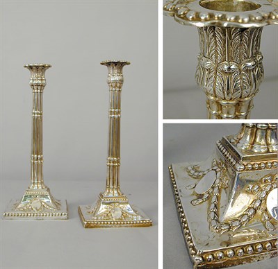 Lot 335 - Pair of George III Silver Candlesticks Weighted.