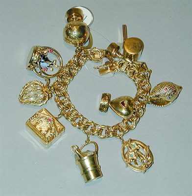 Lot 268 - Gold Charm Bracelet 14 kt. yellow gold, the...