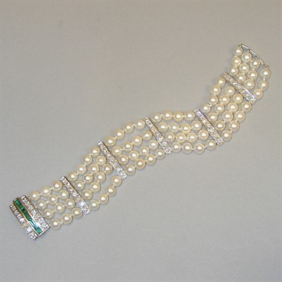 Lot 390 - Diamond, Emerald and Pearl Bracelet The four...
