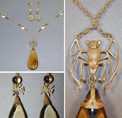 Lot 250 - Citrine Pendant and Pair of Earrings 14 kt....