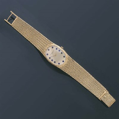Lot 379 - Lady's Gold Wristwatch 18 kt. yellow gold, the...