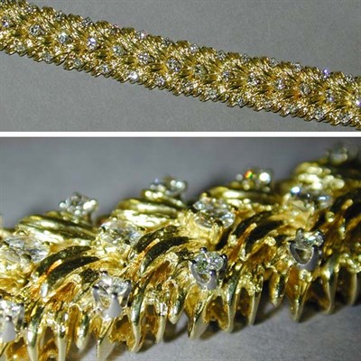 Lot 423 - Gold and Diamond Bracelet 18 kt. yellow gold,...