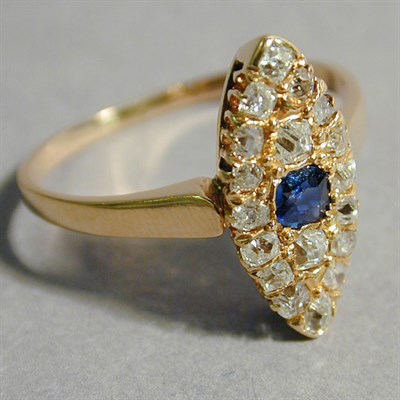 Lot 91 - Sapphire and Diamond Dinner Ring 14 kt. yellow...