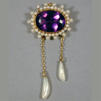 Lot 77 - Amethyst and Natural* Pearl Pendant 14 kt....