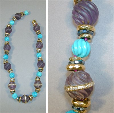 Lot 166 - Fluted Amethyst and Turquoise Bead Necklace...