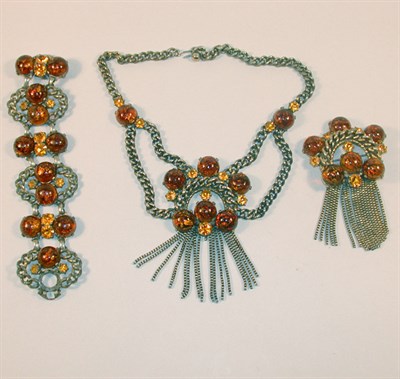 Lot 371 - Schiaparelli Brown Stone Suite French, 1940s...