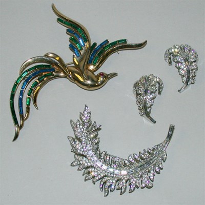 Lot 377 - Trifari Pins and Set 1950s/60s The first a...