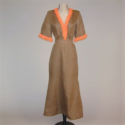 Lot 224 - Nina Ricci Coral Trimmed Gown French, circa...