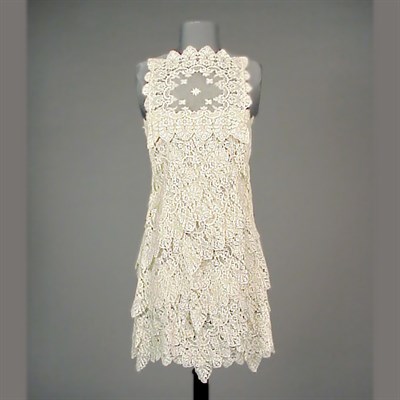 Lot 75 - Galanos White Lace Mini Dress American, 1960s...