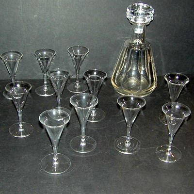 Lot 181 - Comprising a decanter and eleven cordials.