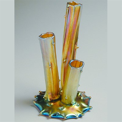 Lot 98 - Steuben Aurene Glass Flower Holder Formed as...
